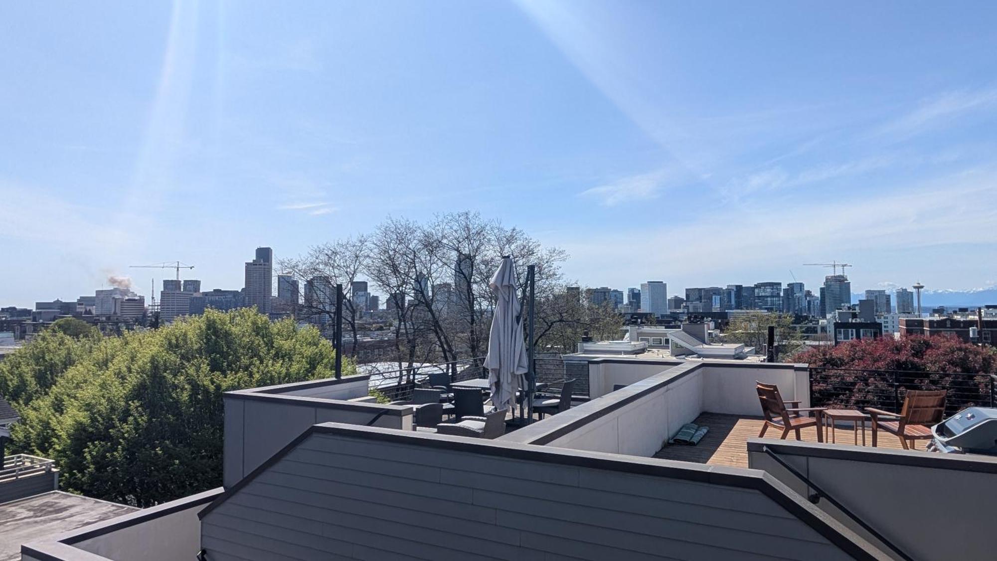 Rooftop Views Of The Space Needle, Sound, & Seattle